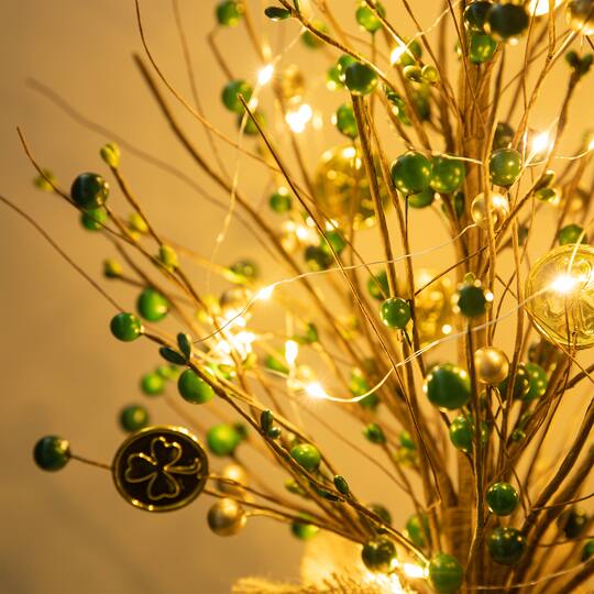 Glitzhome® 21" Lighted St. Patrick's Gold Coin Table Tree